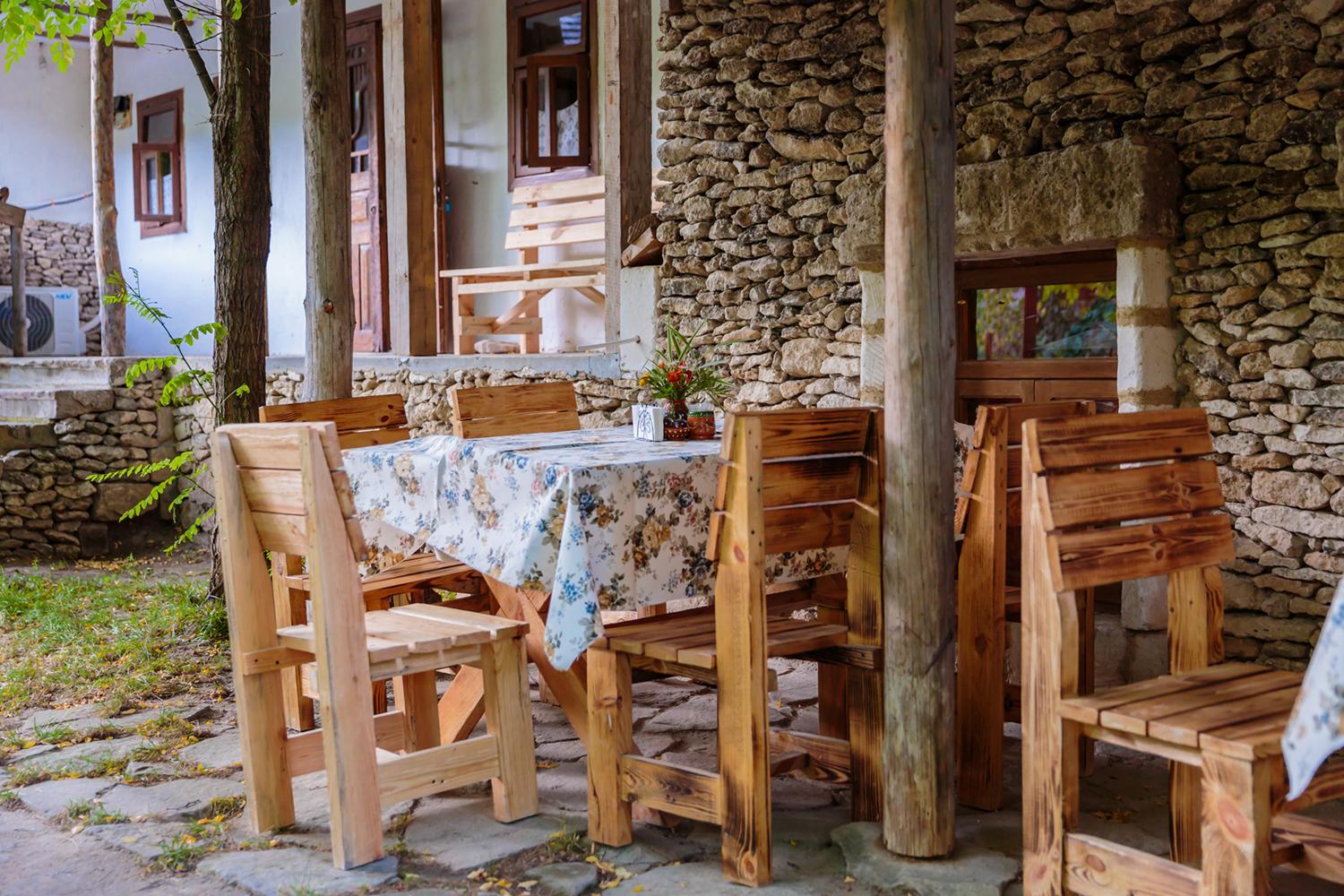 Traditional veranda and outdoor seating at Eco Resort Butuceni
