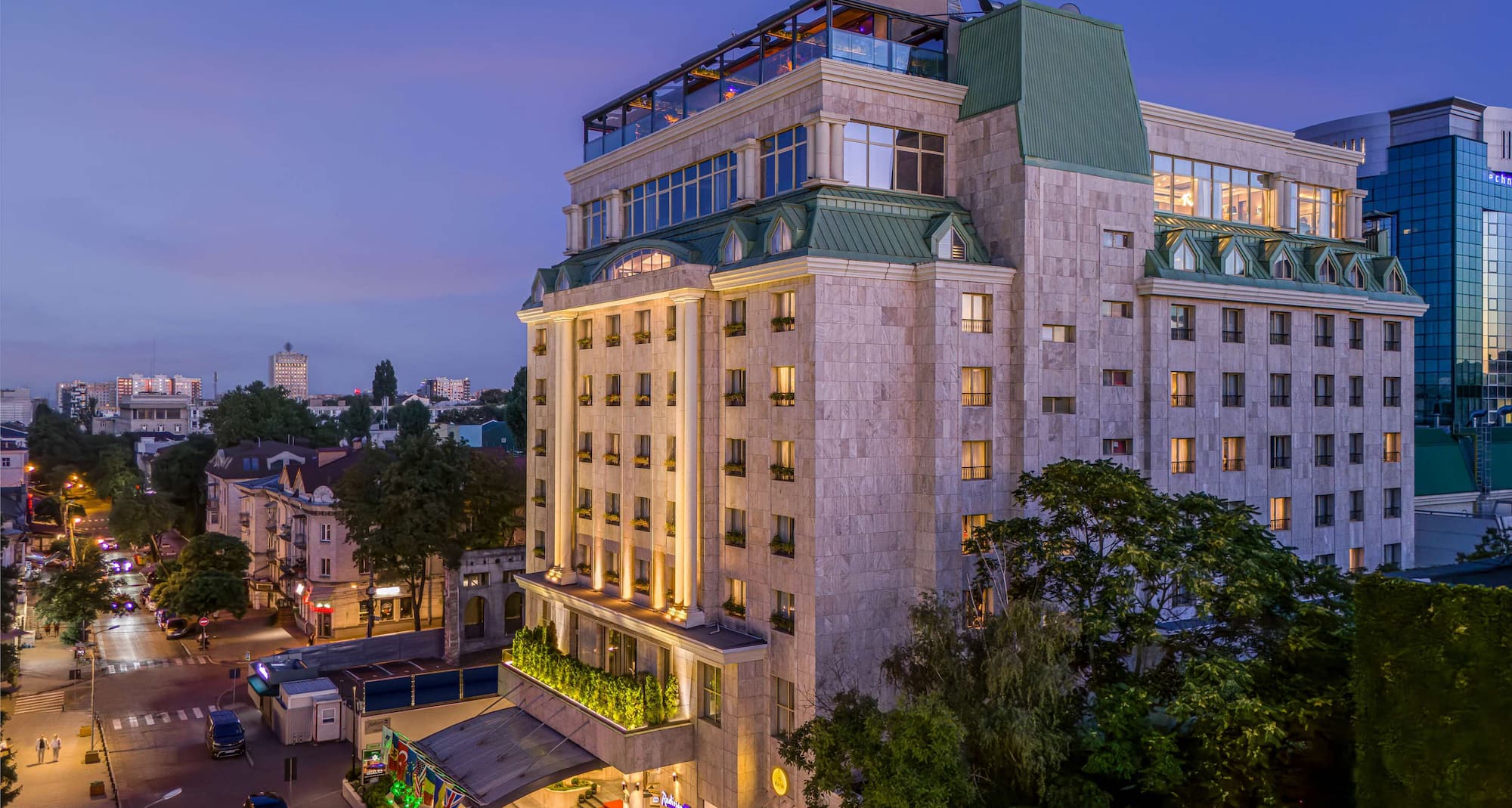 Radisson Blu Leogrand Hotel in Chișinău, exterior at dusk
